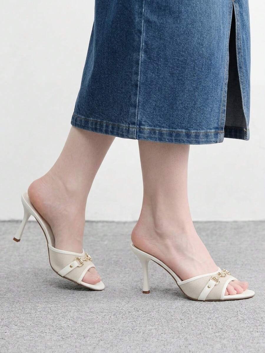 Women's beige high heel mule sandals with open round toe and metal chain detail
