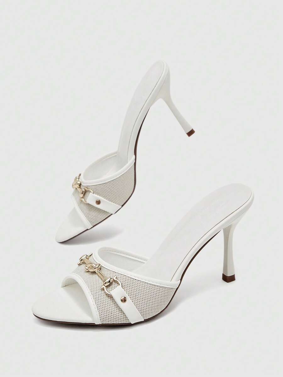 Women's beige high heel mule sandals with open round toe and metal chain detail