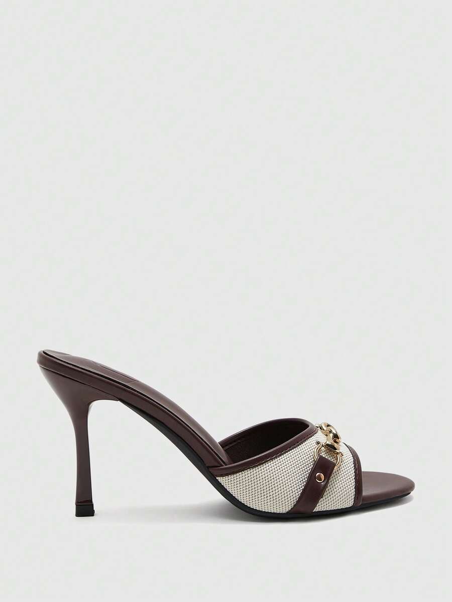 Women's beige high heel mule sandals with open round toe and metal chain detail
