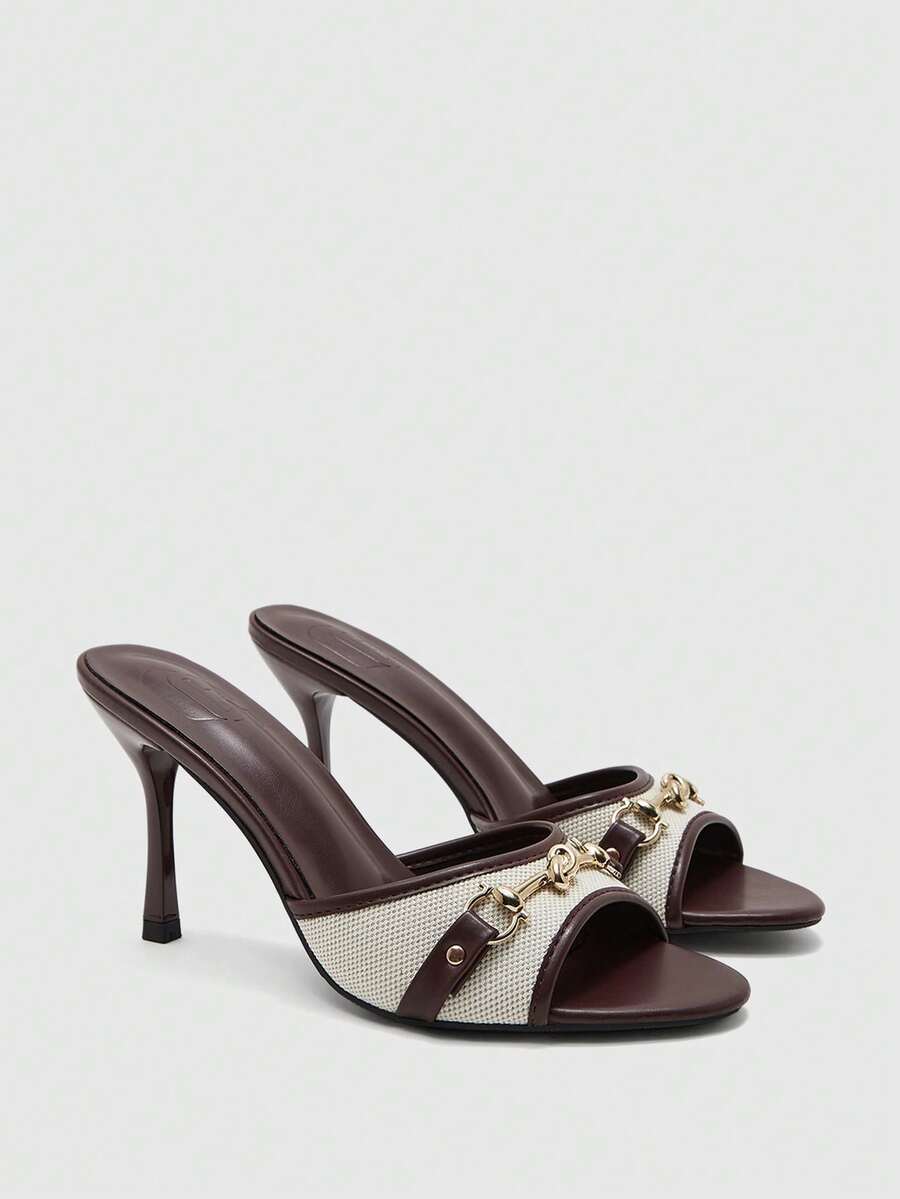 Women's beige high heel mule sandals with open round toe and metal chain detail