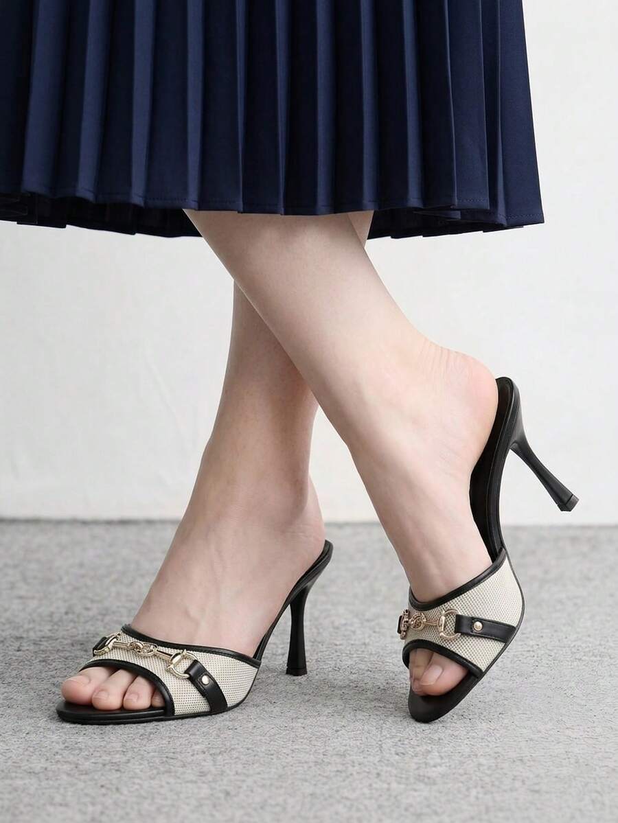 Women's beige high heel mule sandals with open round toe and metal chain detail