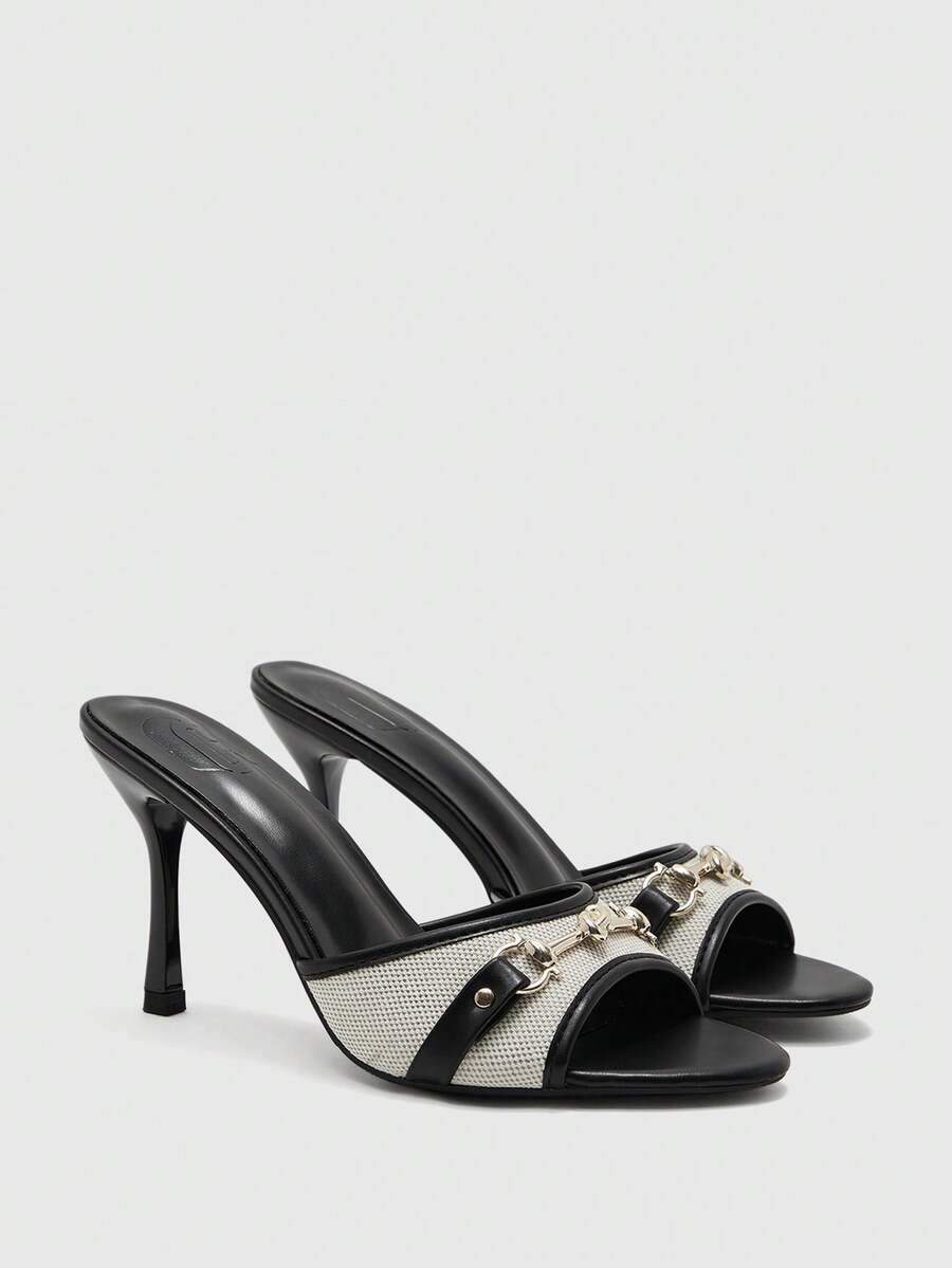 Women's beige high heel mule sandals with open round toe and metal chain detail