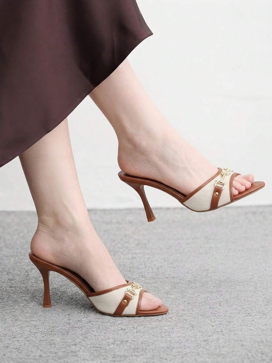 Women's beige high heel mule sandals with open round toe and metal chain detail