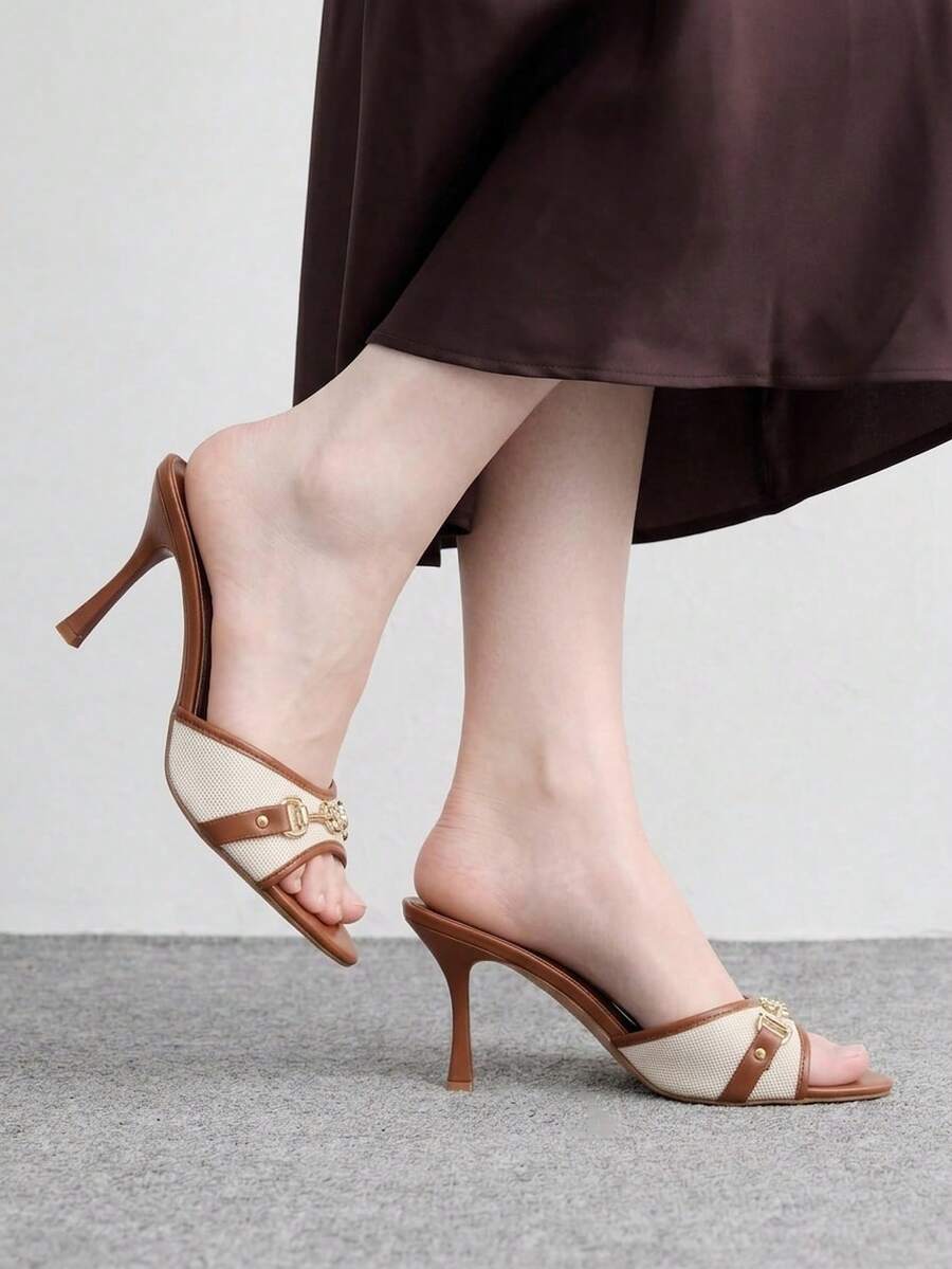 Women's beige high heel mule sandals with open round toe and metal chain detail