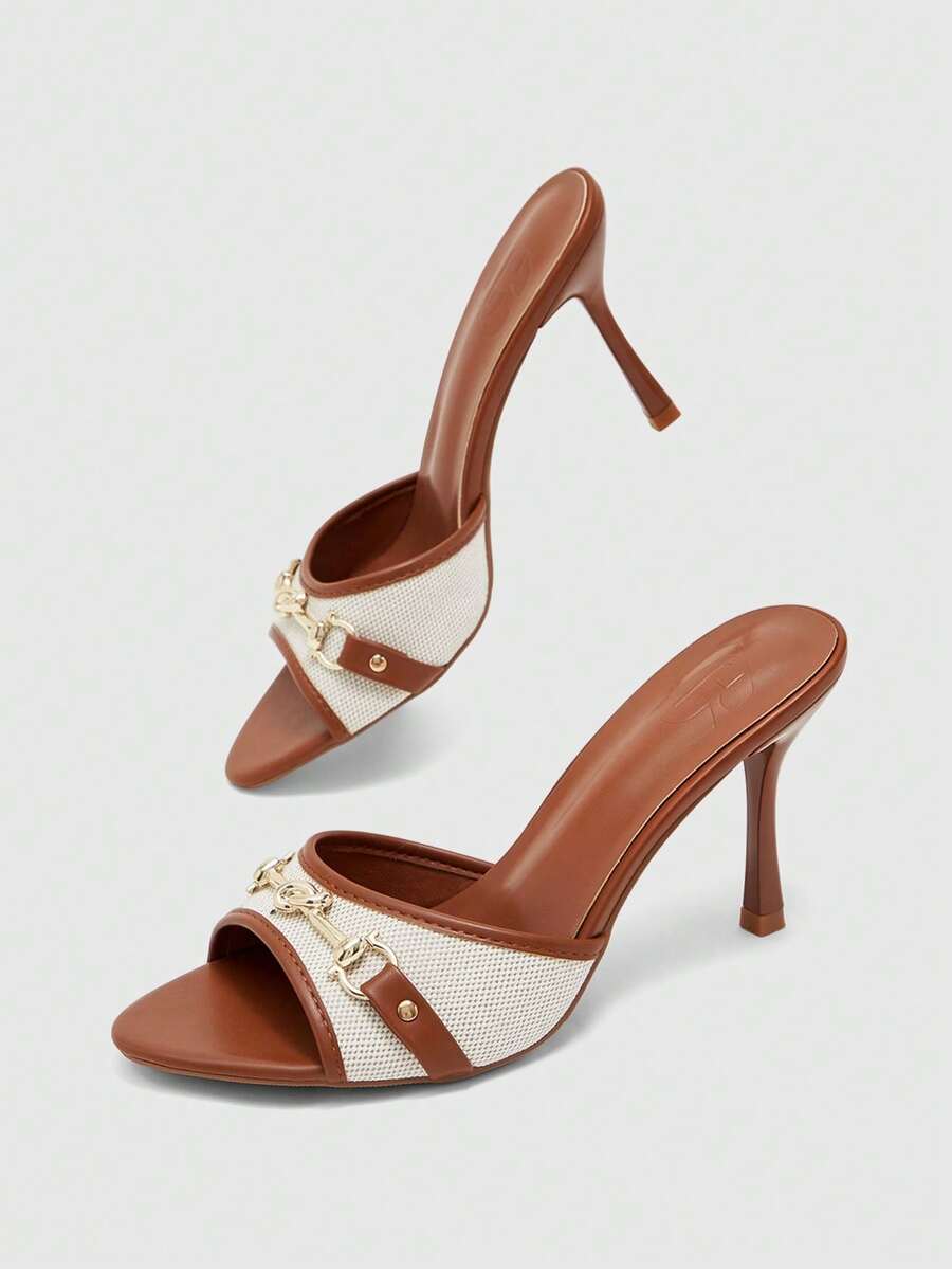 Women's beige high heel mule sandals with open round toe and metal chain detail