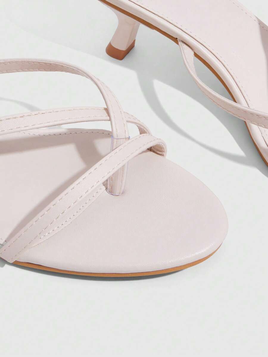 Women's open-toed high-heeled sandals featuring a 5.5cm kitten heel stiletto, sleek ankle strap with buckle closure, and smooth PU leather finish.