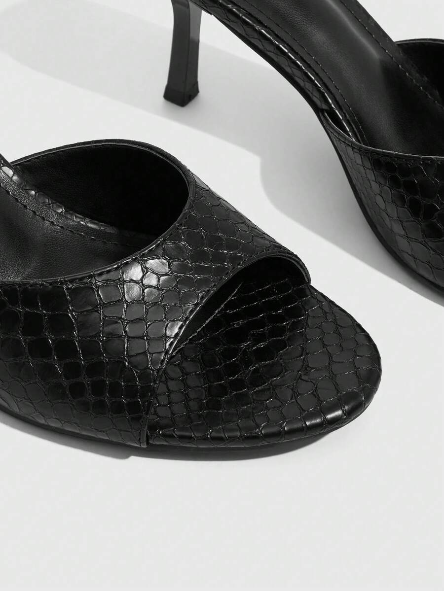 Pair of women's open toe high heel slingback sandals made with smooth PU leather