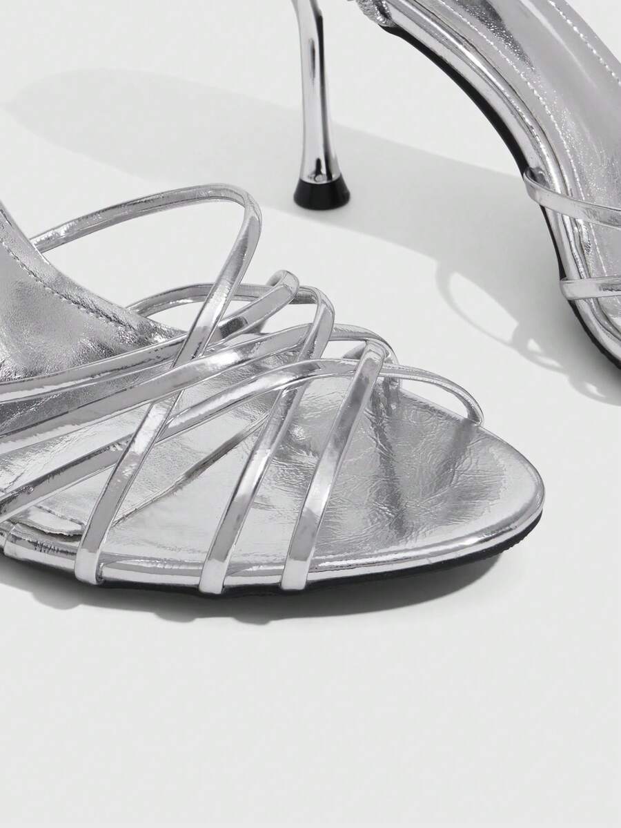 Women's cross strap square heel sandals featuring open toe and slingback design