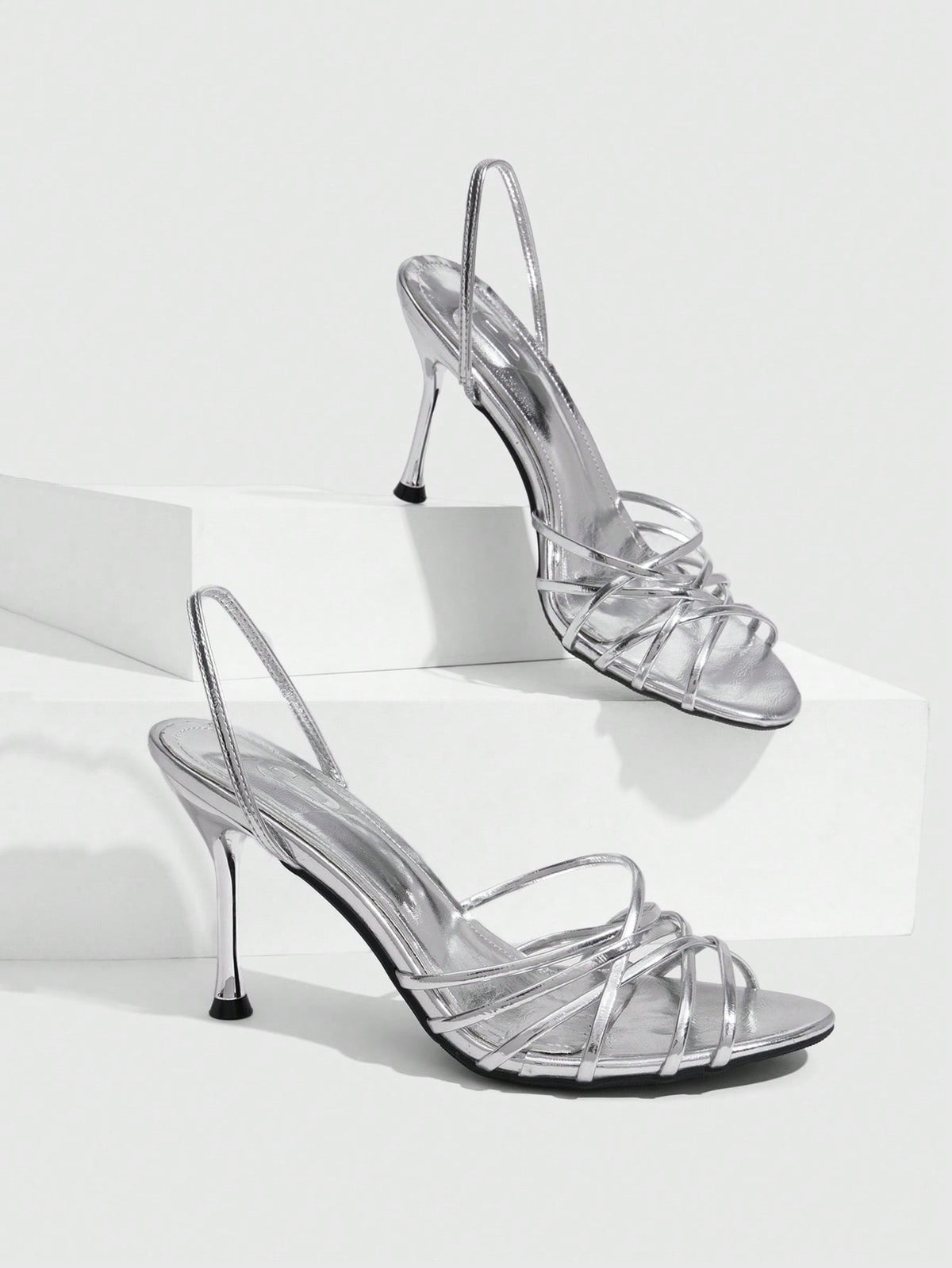 Women's cross strap square heel sandals featuring open toe and slingback design