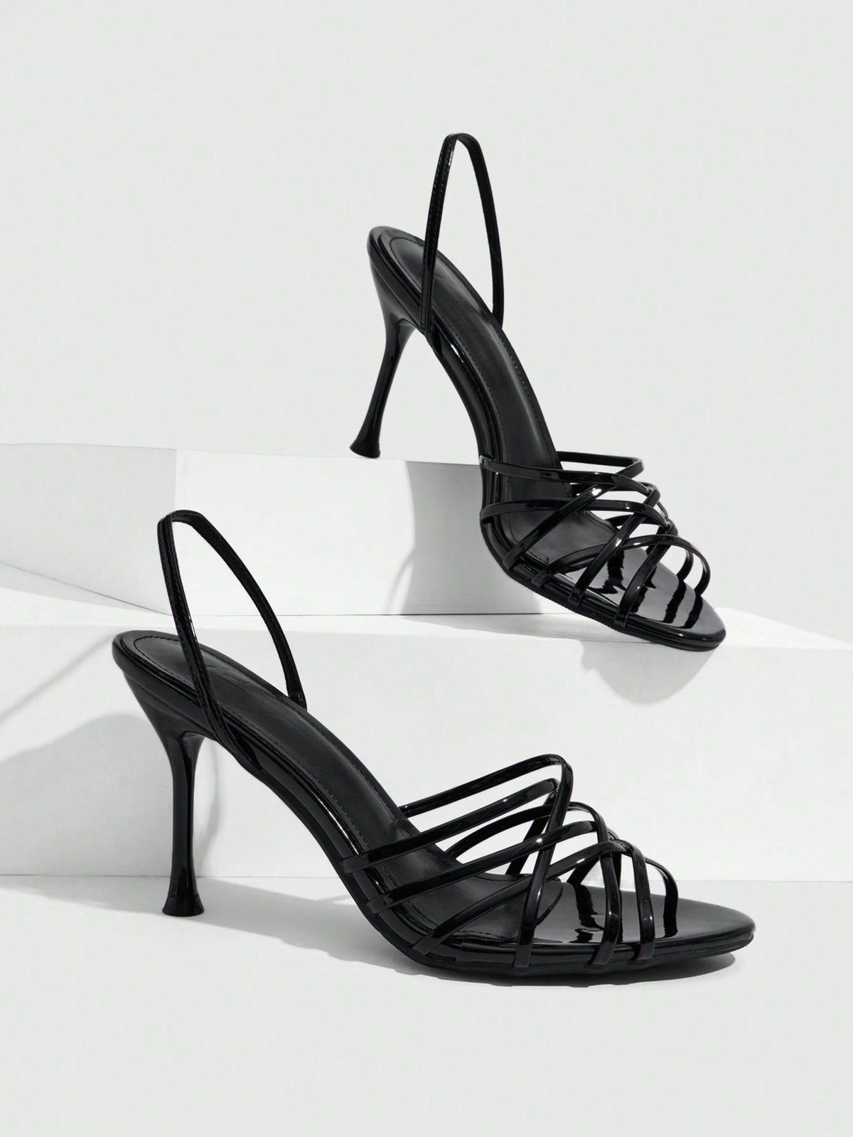Women's cross strap square heel sandals featuring open toe and slingback design