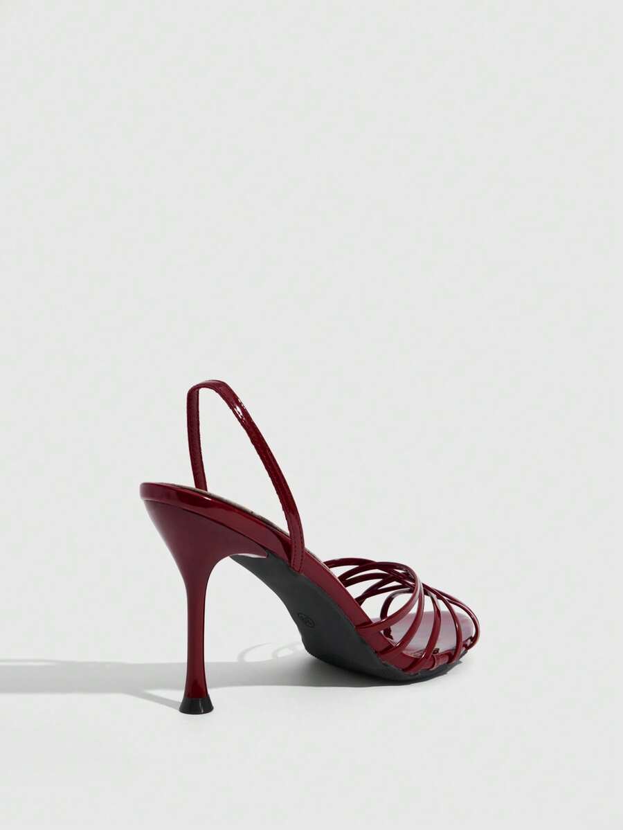 Women's cross strap square heel sandals featuring open toe and slingback design