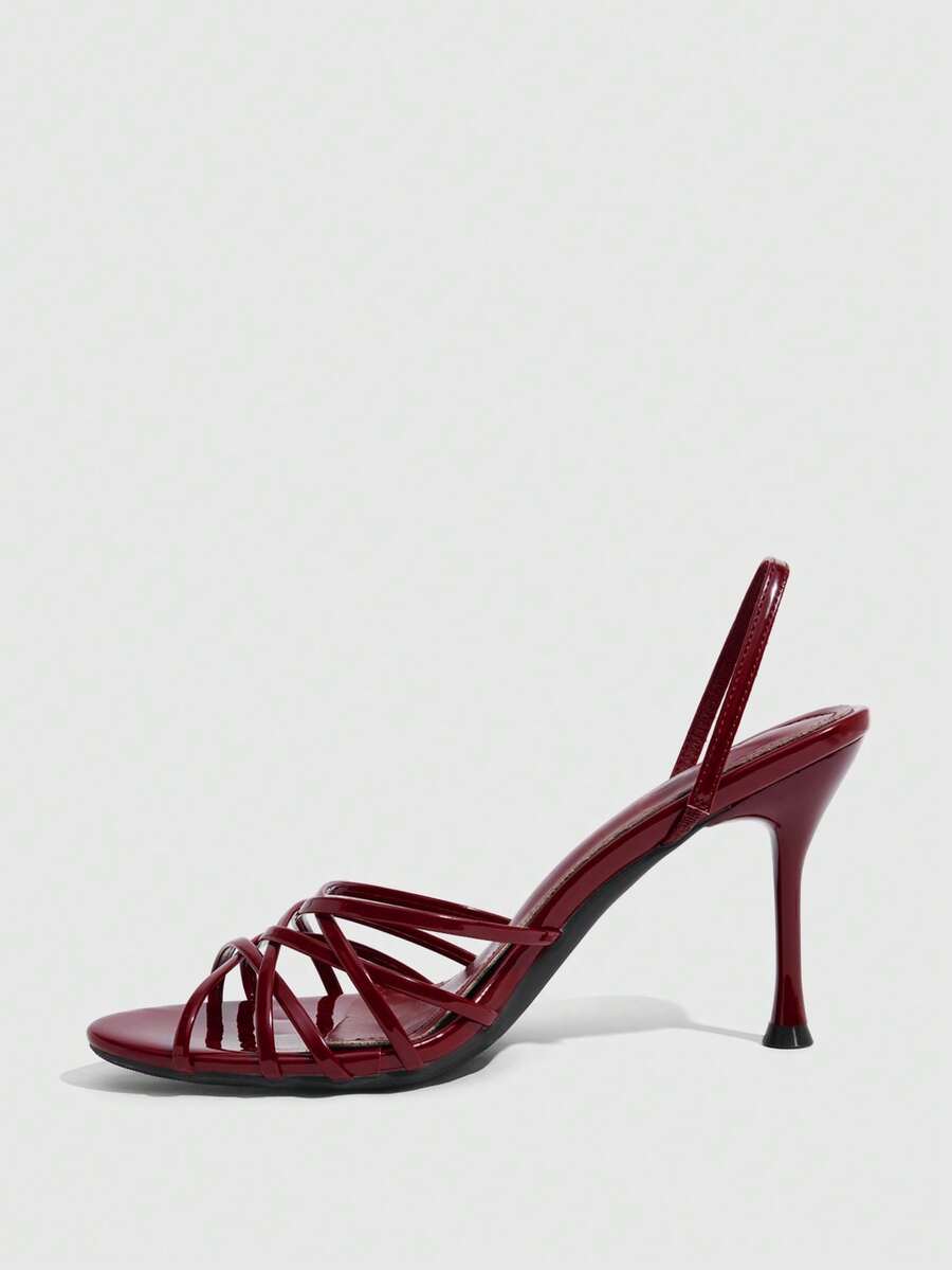 Women's cross strap square heel sandals featuring open toe and slingback design