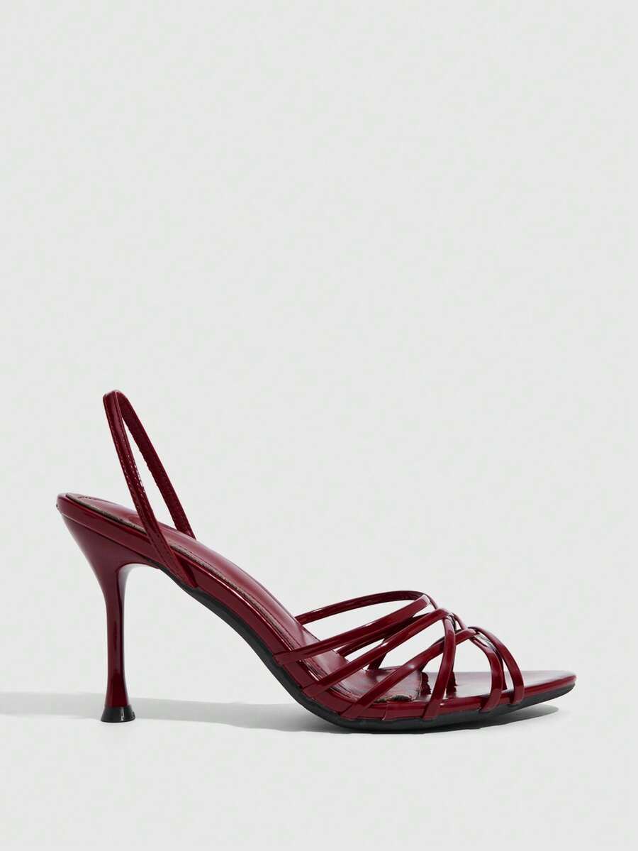 Women's cross strap square heel sandals featuring open toe and slingback design