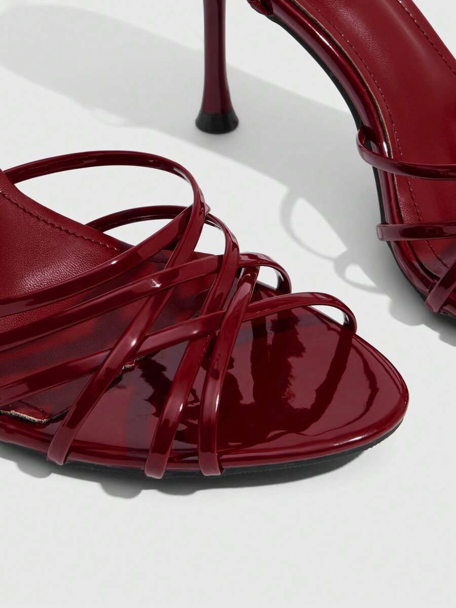 Women's cross strap square heel sandals featuring open toe and slingback design