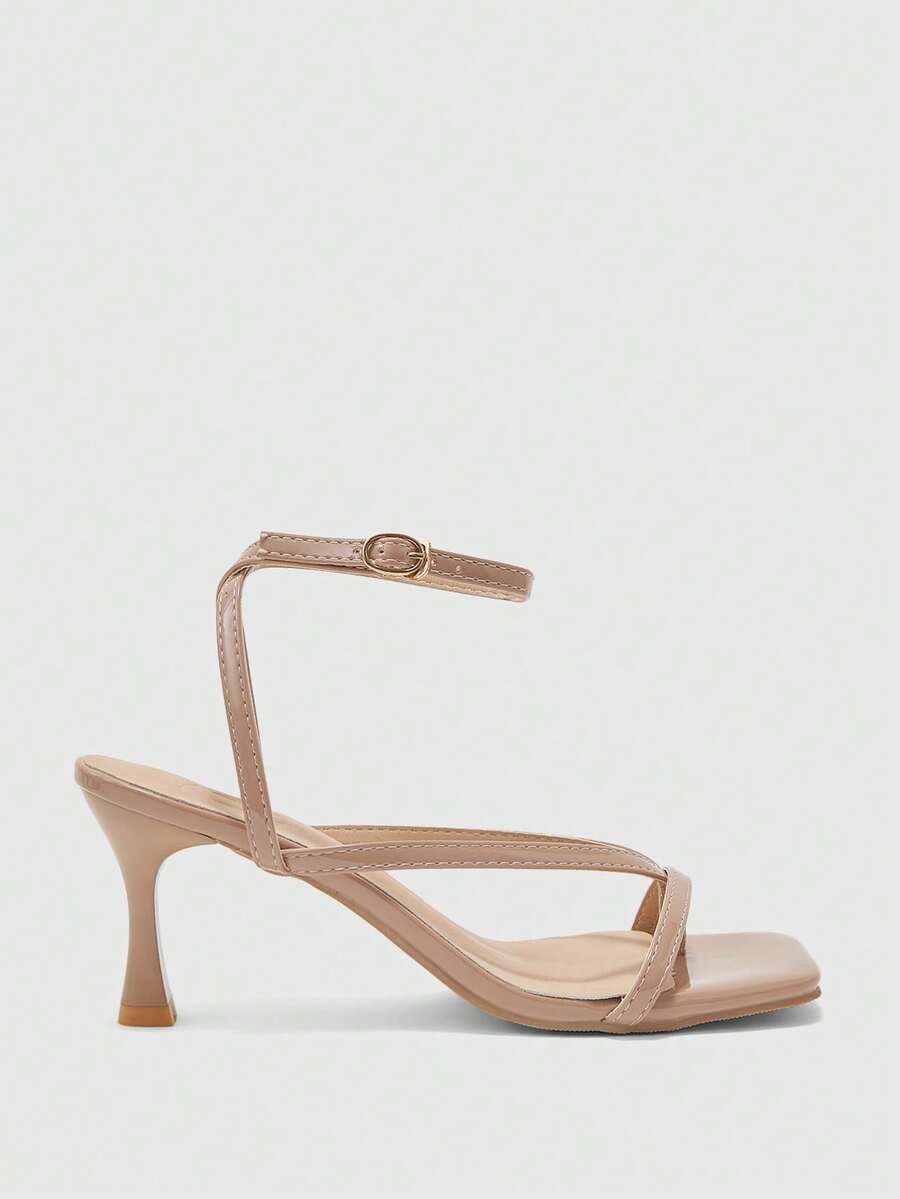 Burgundy women's thin strap thong sandals with ankle strap and kitten heels.