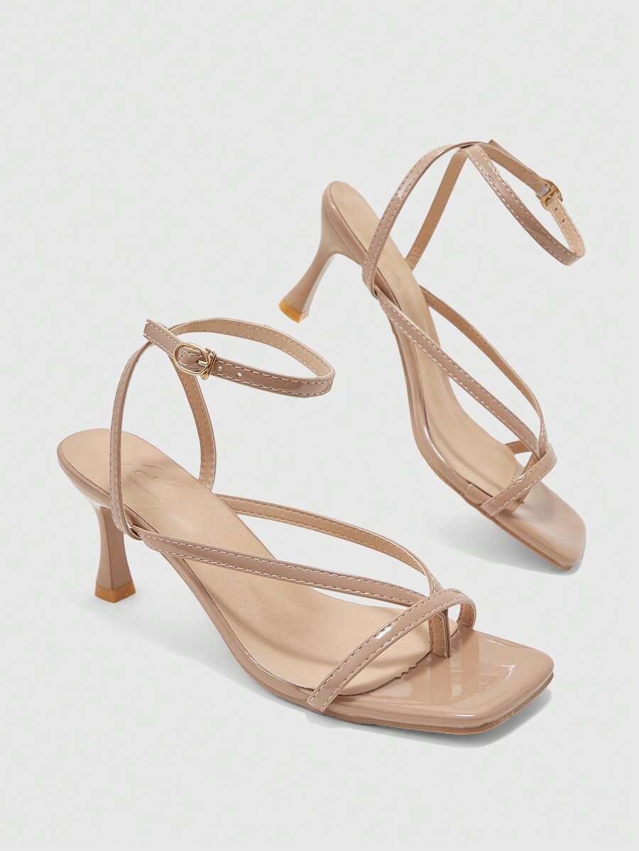 Burgundy women's thin strap thong sandals with ankle strap and kitten heels.