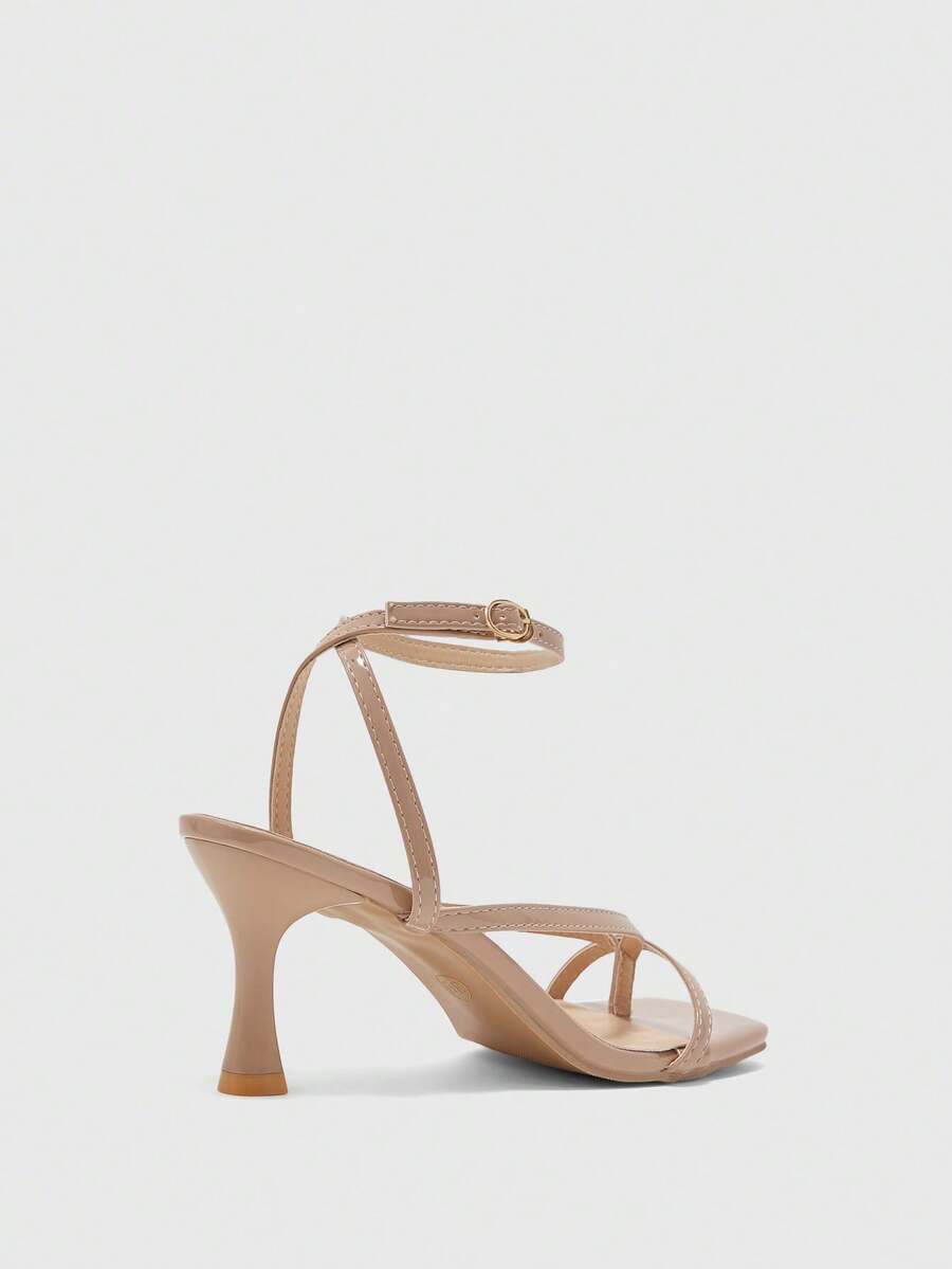 Burgundy women's thin strap thong sandals with ankle strap and kitten heels.