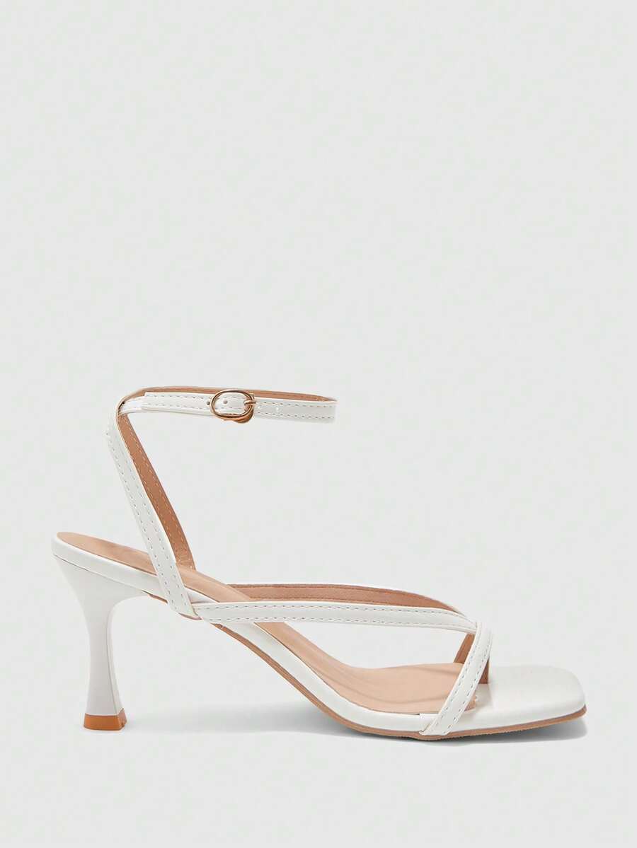 Burgundy women's thin strap thong sandals with ankle strap and kitten heels.