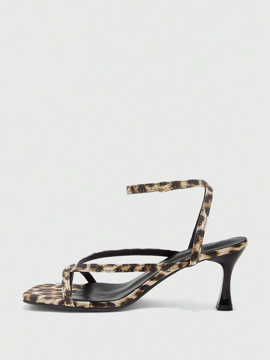 Burgundy women's thin strap thong sandals with ankle strap and kitten heels.