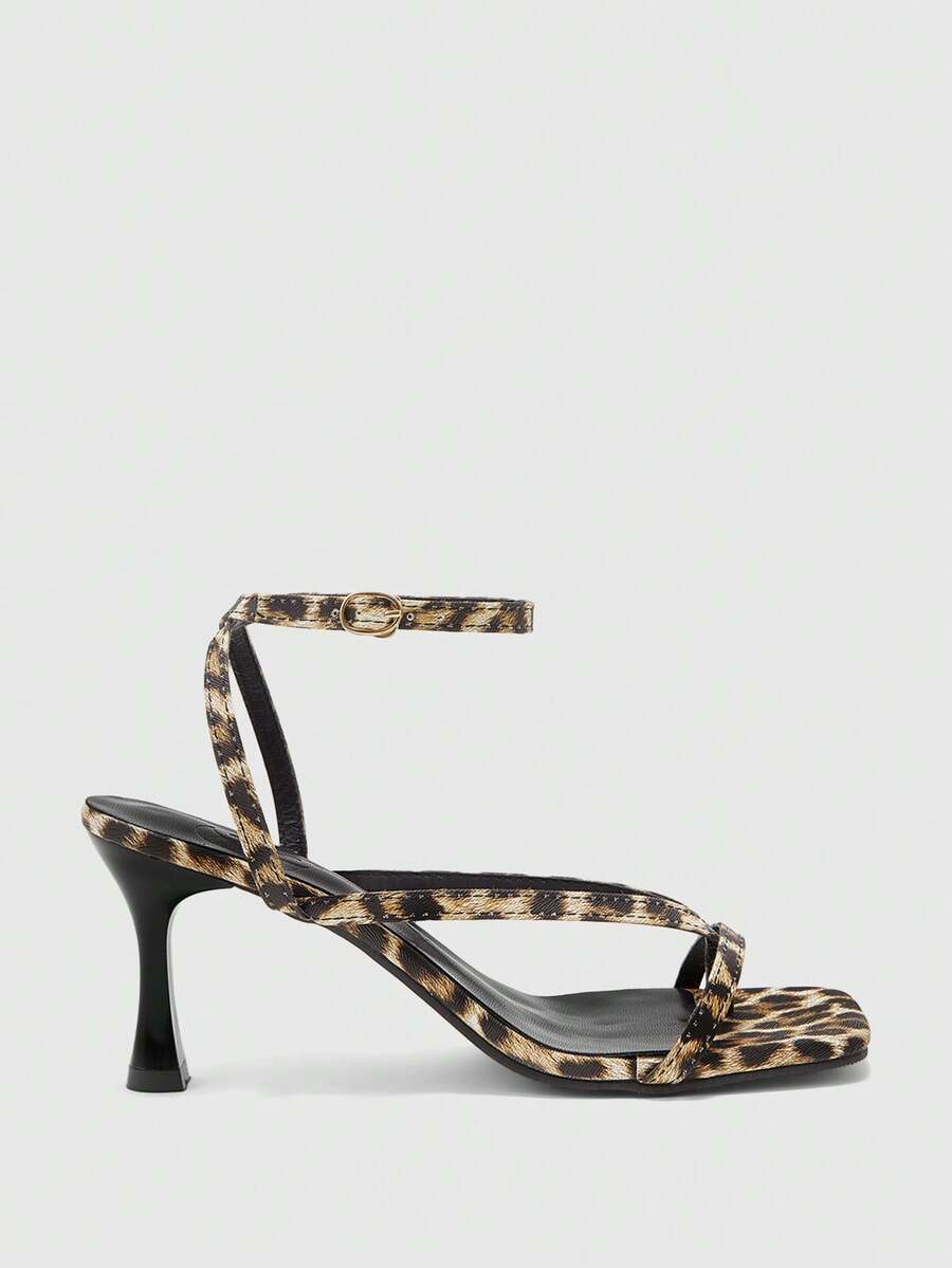 Burgundy women's thin strap thong sandals with ankle strap and kitten heels.