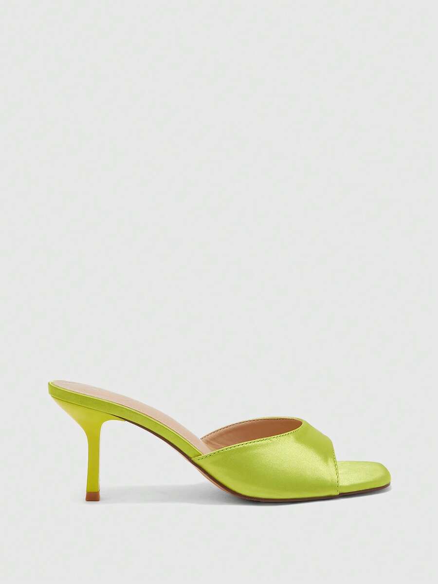 Women's black square toe high heel sandals featuring an open toe design, thin stiletto heel, and slingback strap.
