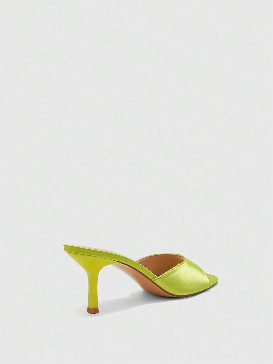 Women's black square toe high heel sandals featuring an open toe design, thin stiletto heel, and slingback strap.
