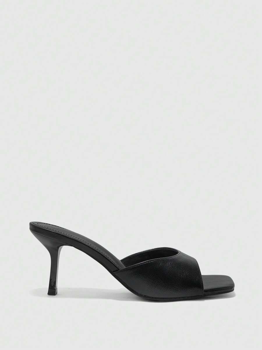 Women's black square toe high heel sandals featuring an open toe design, thin stiletto heel, and slingback strap.