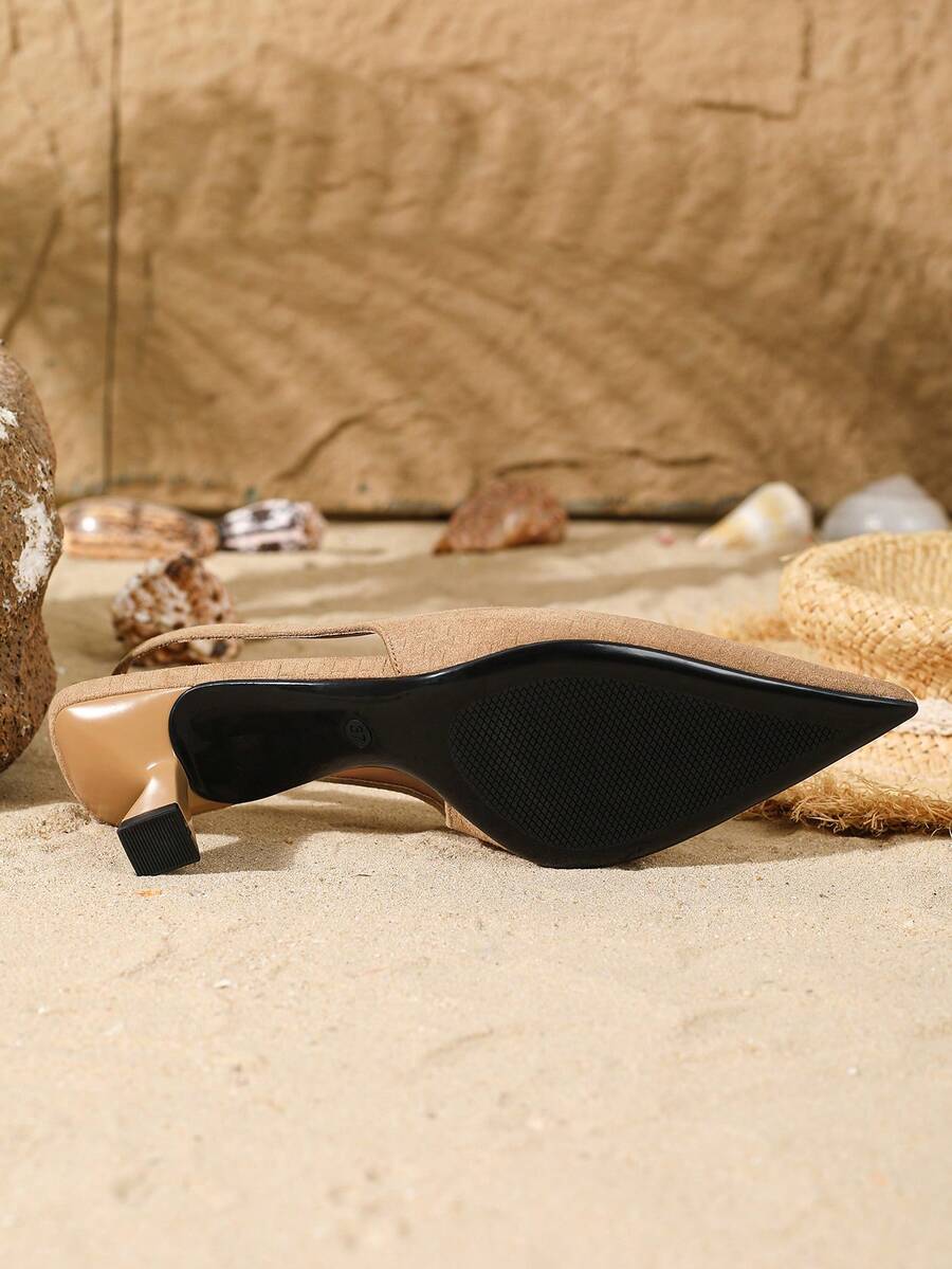 Women's elegant velvet kitten heel slingback pumps featuring a pointed closed toe and slip-on strap design.