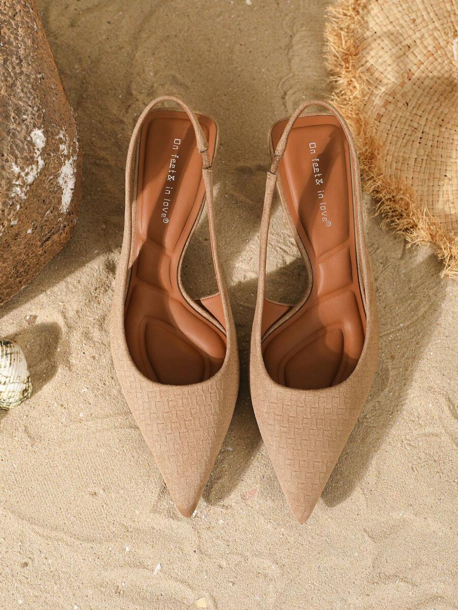 Women's elegant velvet kitten heel slingback pumps featuring a pointed closed toe and slip-on strap design.