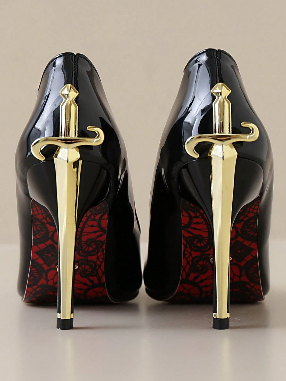 Glossy black pointed toe stiletto high heel pumps with bow detail for women