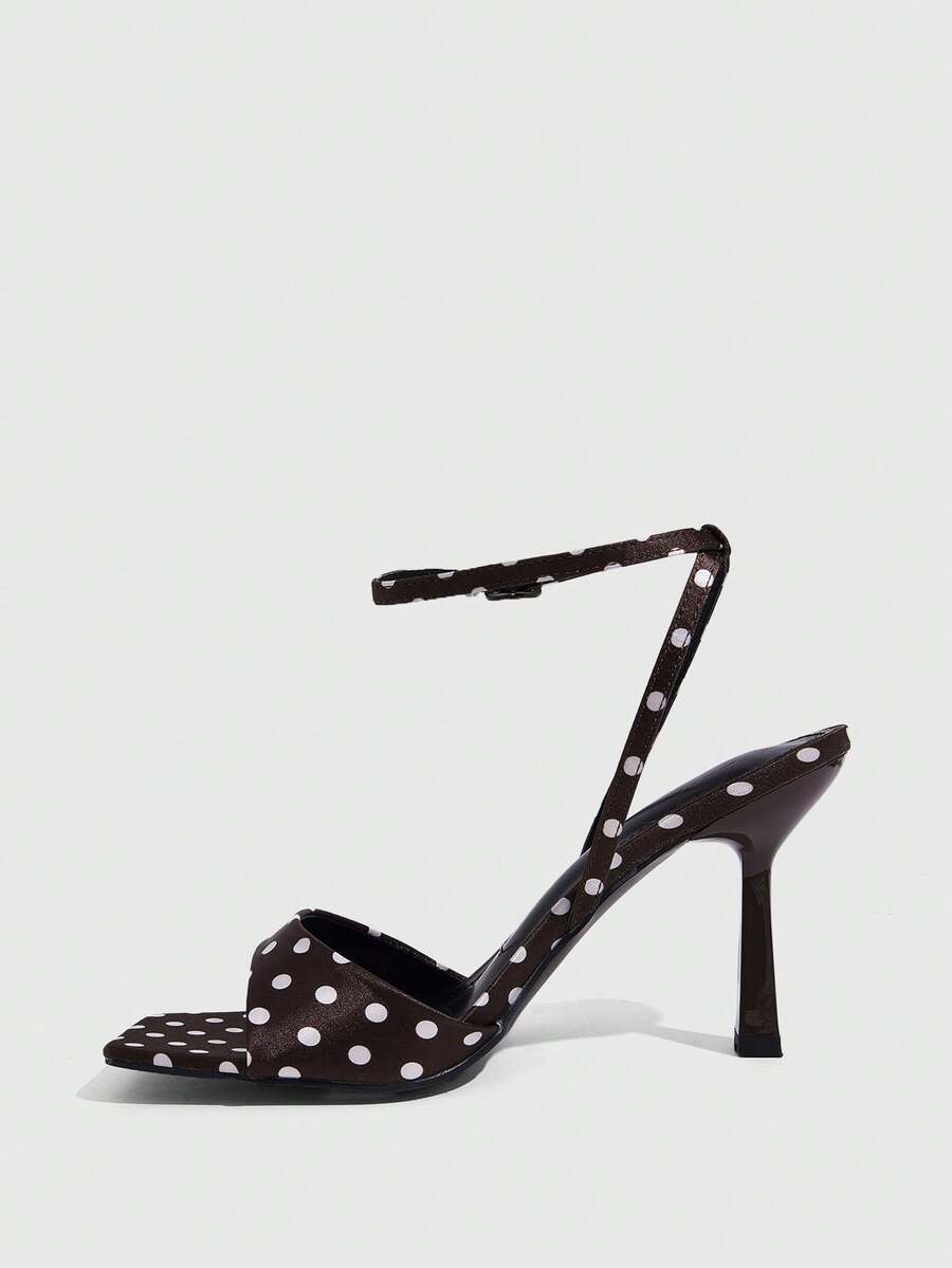 Women's open square toe stiletto high heel sandals featuring thin ankle straps and buckle closure.