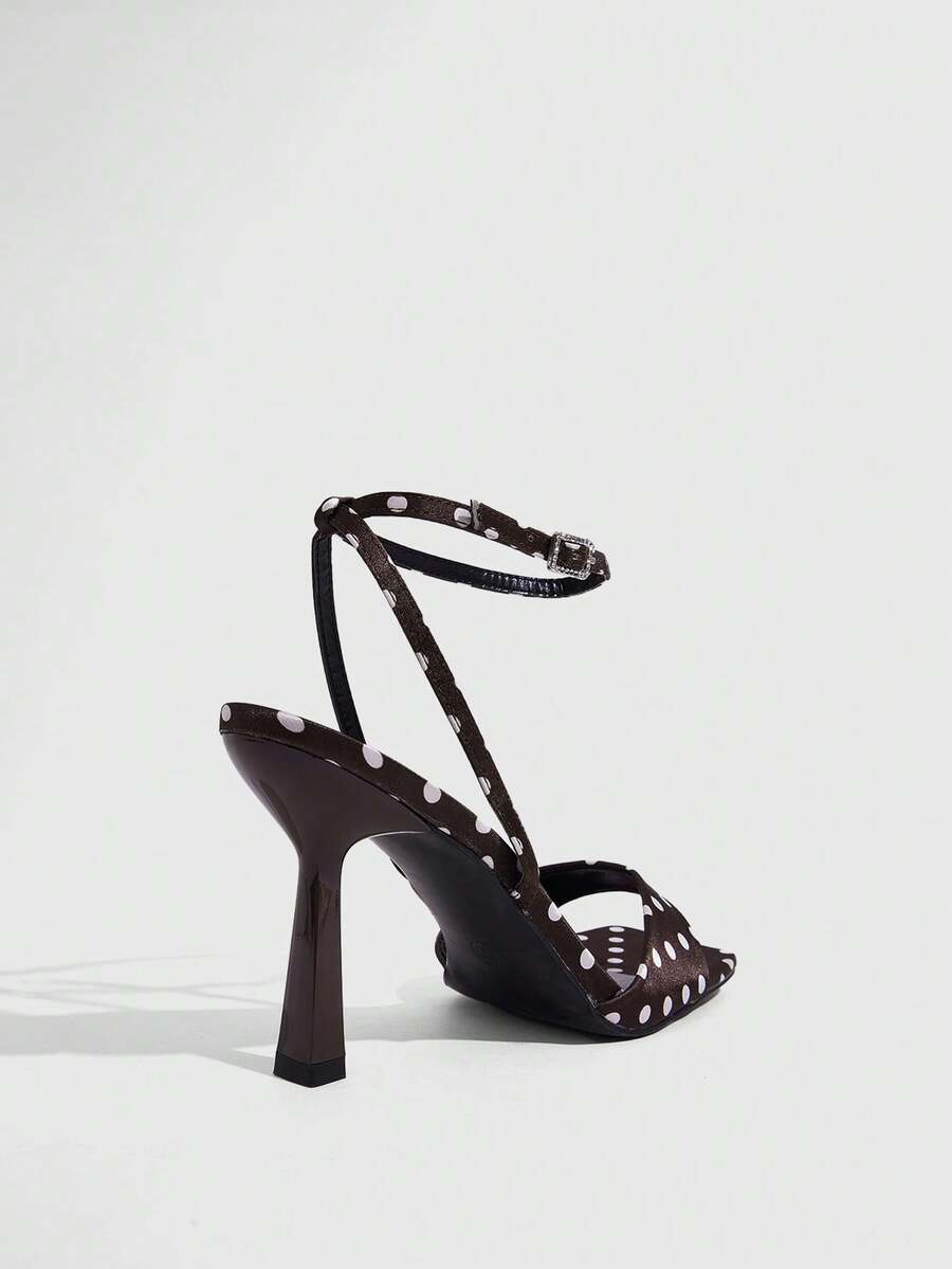 Women's open square toe stiletto high heel sandals featuring thin ankle straps and buckle closure.