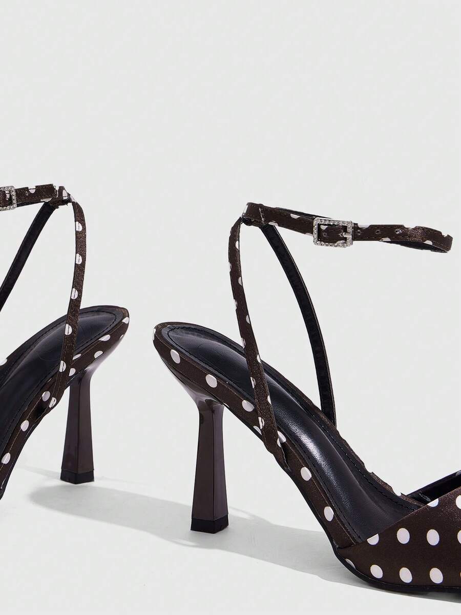 Women's open square toe stiletto high heel sandals featuring thin ankle straps and buckle closure.