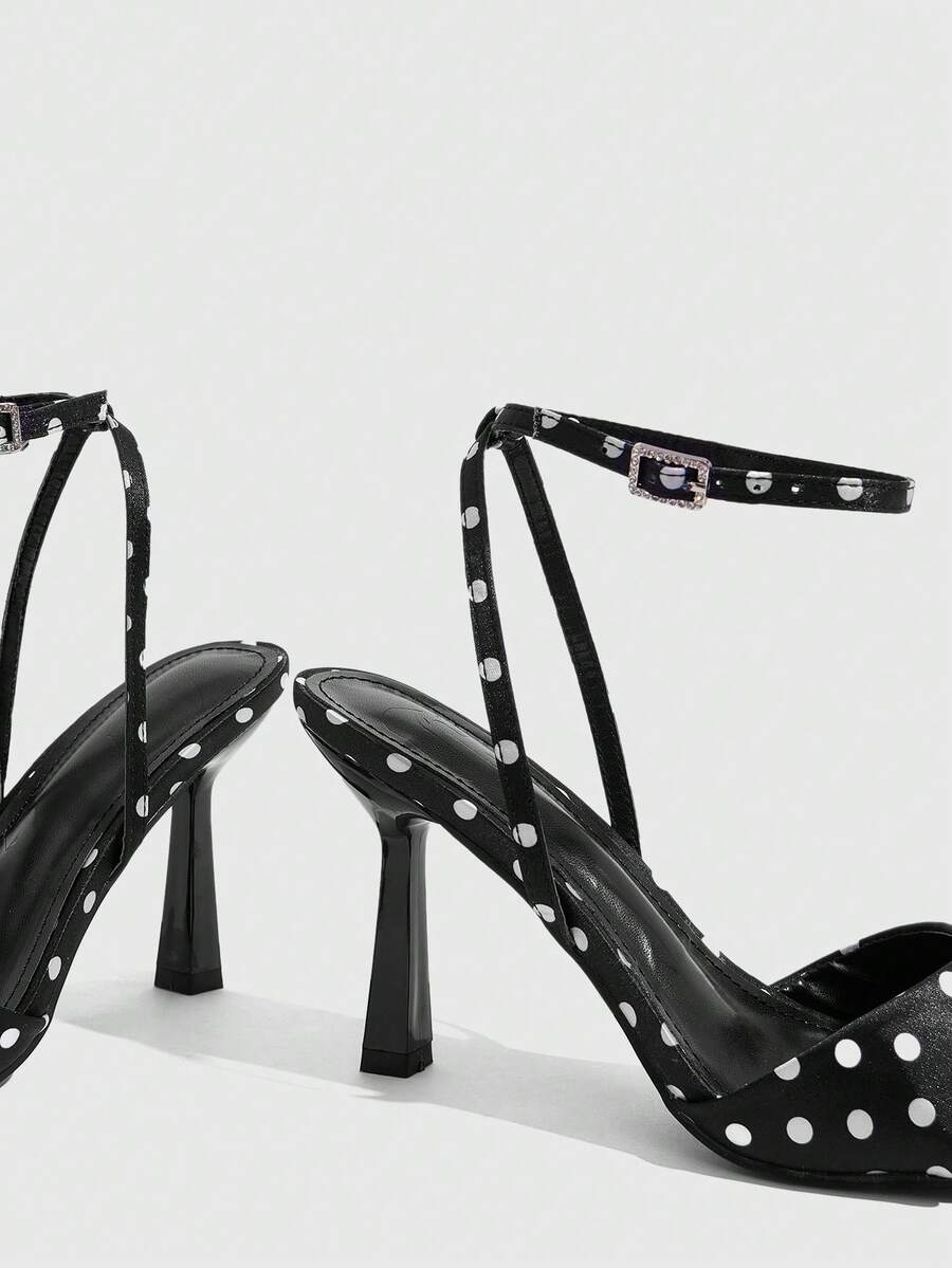 Women's open square toe stiletto high heel sandals featuring thin ankle straps and buckle closure.