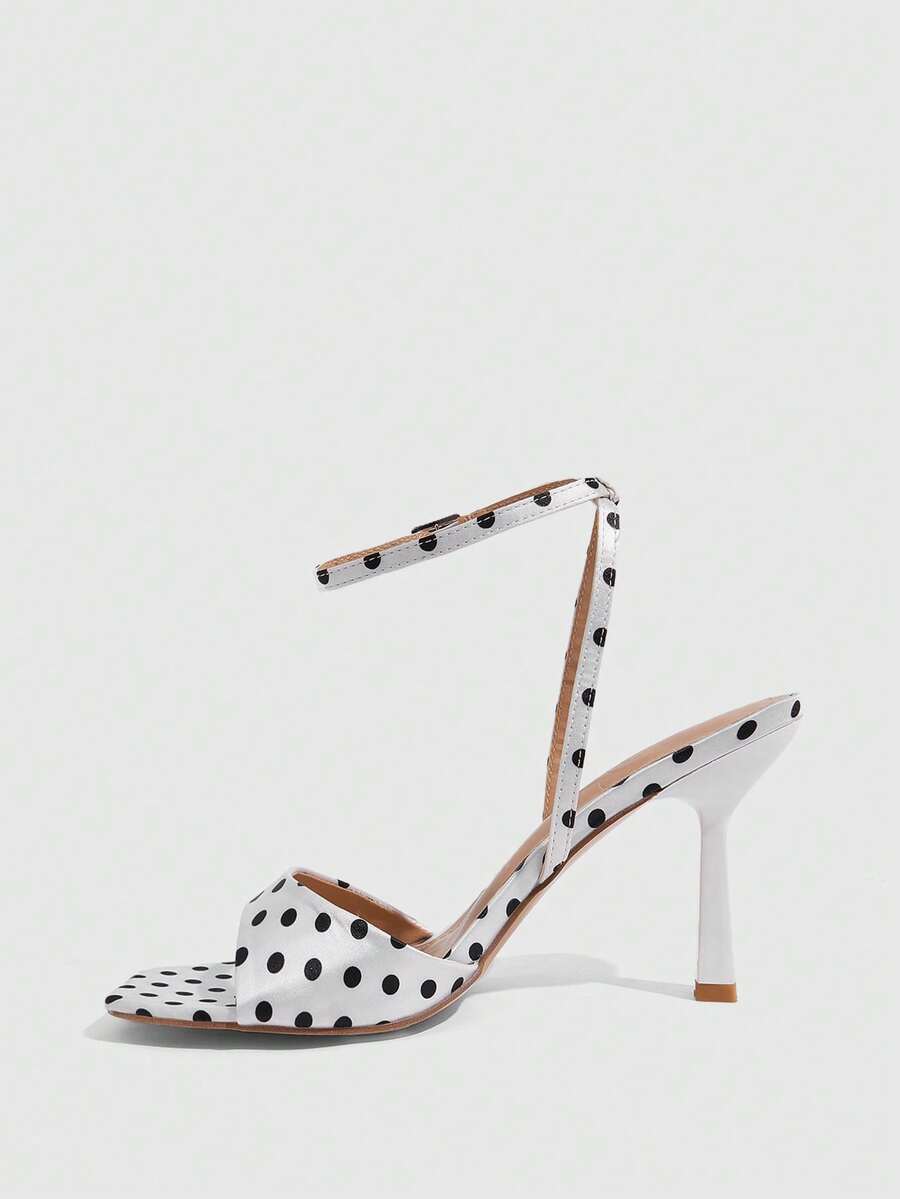 Women's open square toe stiletto high heel sandals featuring thin ankle straps and buckle closure.