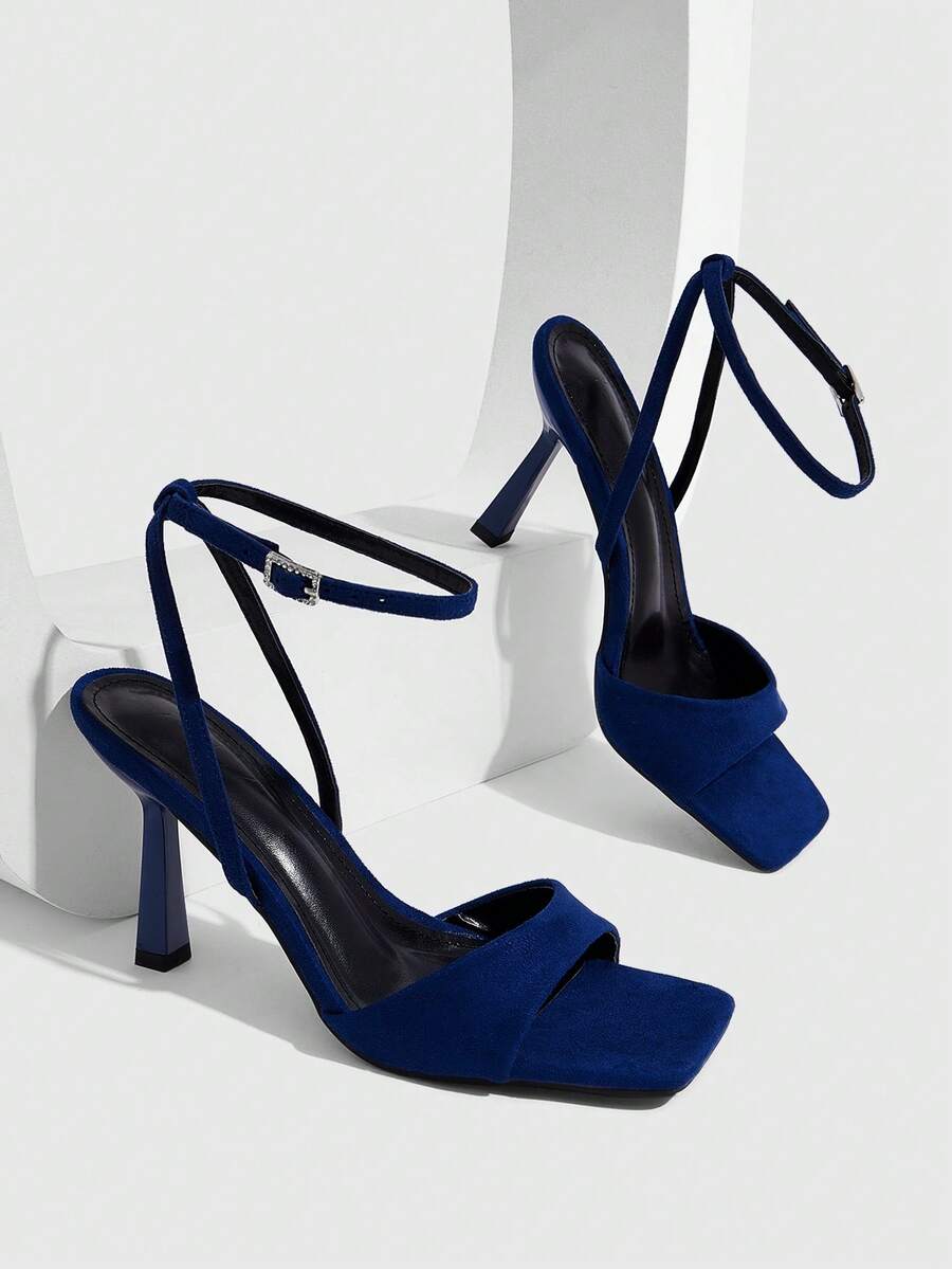 Women's open square toe stiletto high heel sandals featuring thin ankle straps and buckle closure.