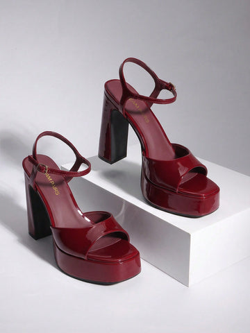 Women's open toe chunky high heel sandals featuring a platform sole, buckle ankle strap, and plain PU leather finish.