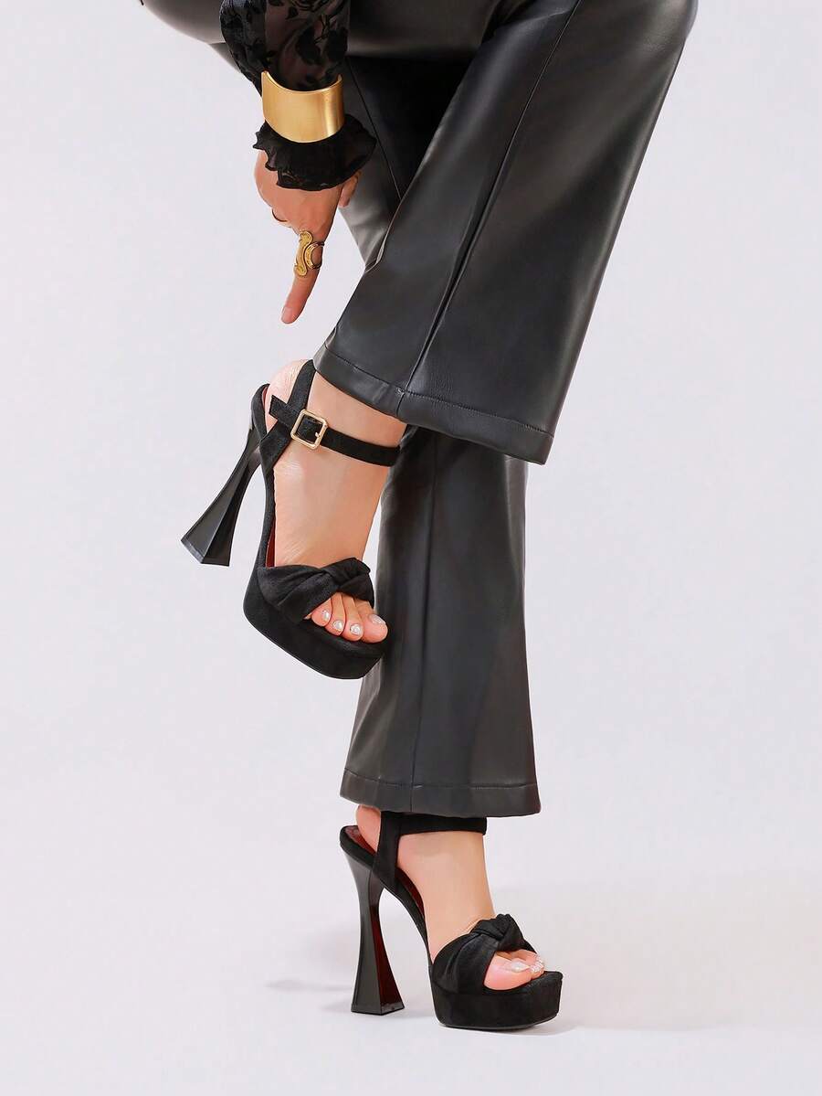 Lace embroidered open toe high heel sandals featuring a chunky square heel, platform wedge, and ankle strap buckle closure.