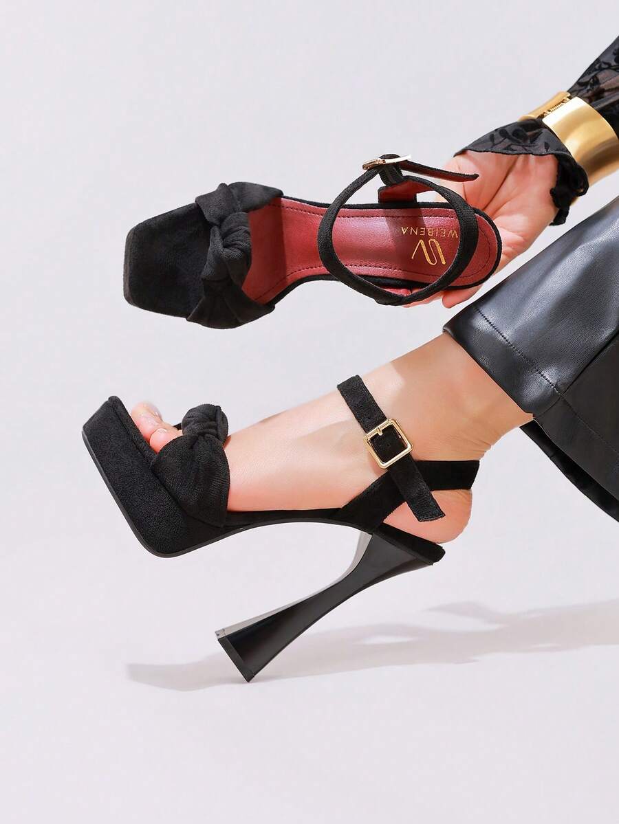 Lace embroidered open toe high heel sandals featuring a chunky square heel, platform wedge, and ankle strap buckle closure.