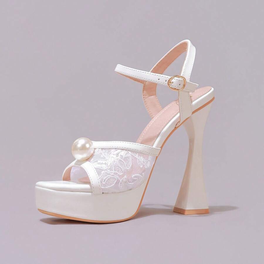 Lace embroidered open toe high heel sandals featuring a chunky square heel, platform wedge, and ankle strap buckle closure.