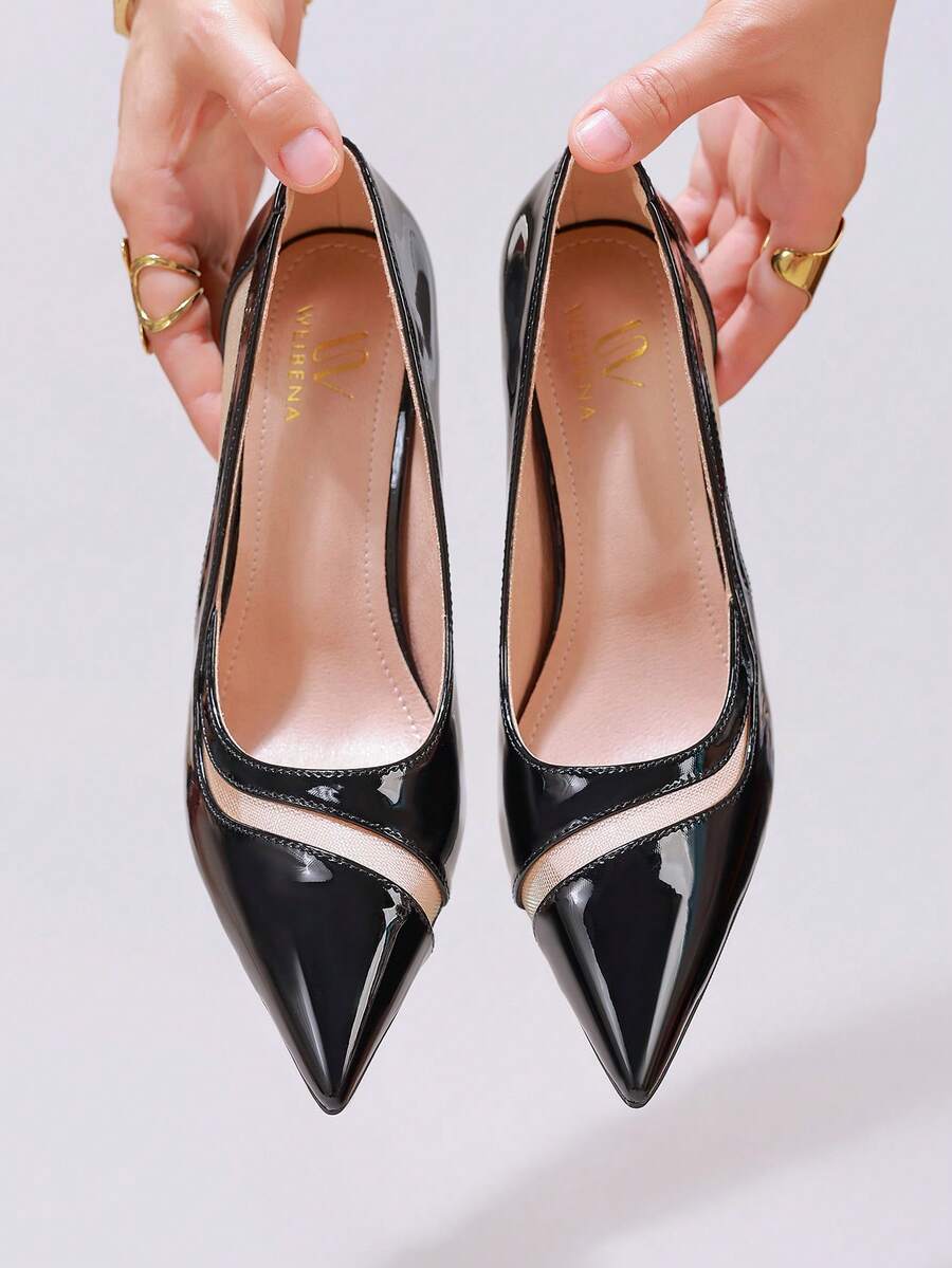 Black lace pointed toe high heel pumps featuring stiletto heels and a decorative bow accent.
