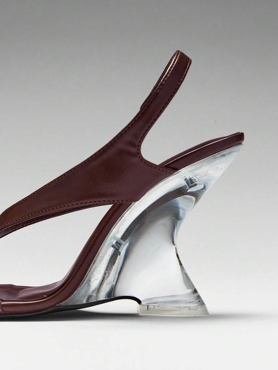 Women's slip-on thong strap wedge sandals featuring a high wedge heel and smooth PU leather upper.