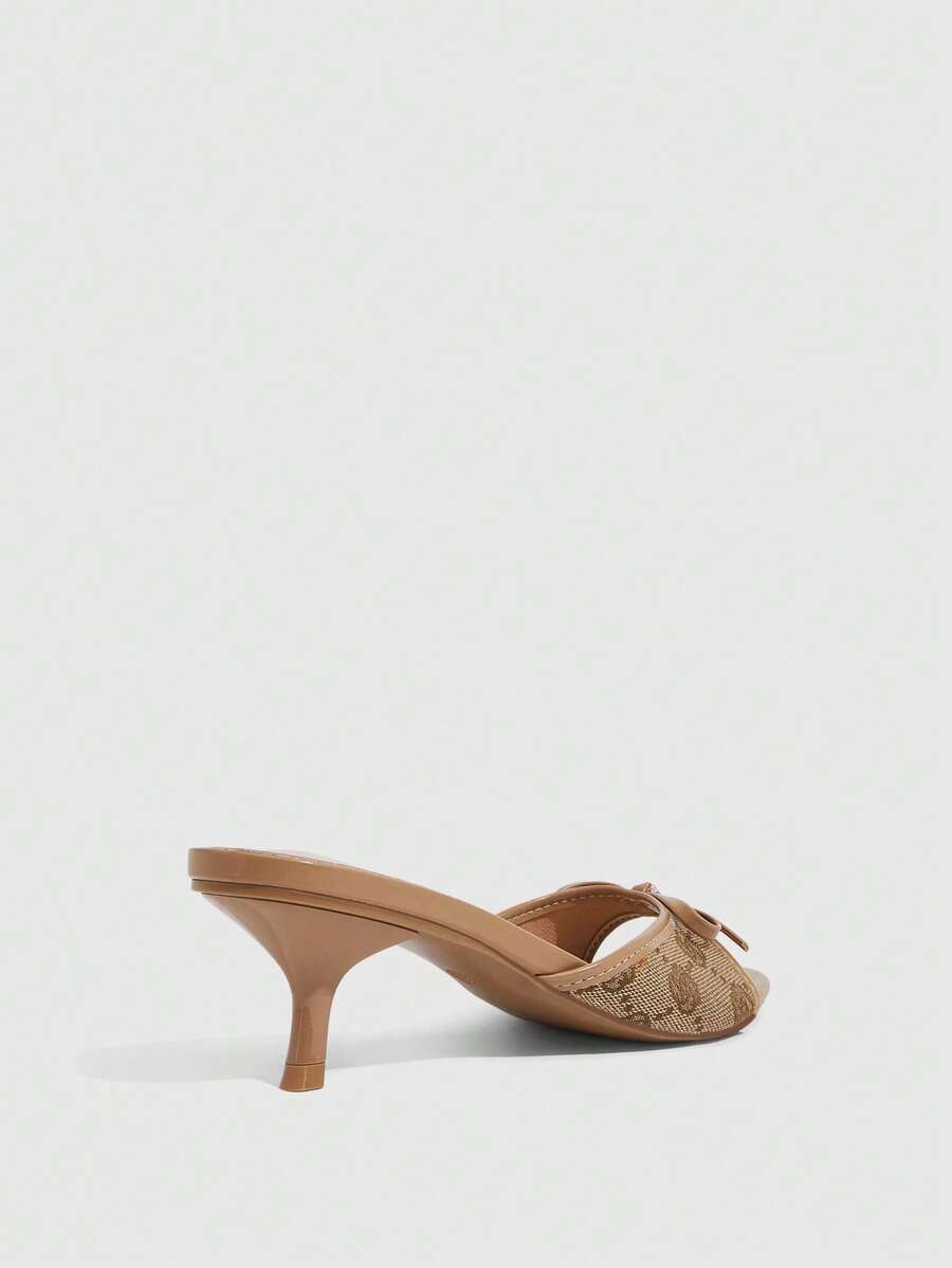 Burgundy high heel sandals for women featuring an open toe, decorative bow, 5.5cm kitten heel, and slingback strap.