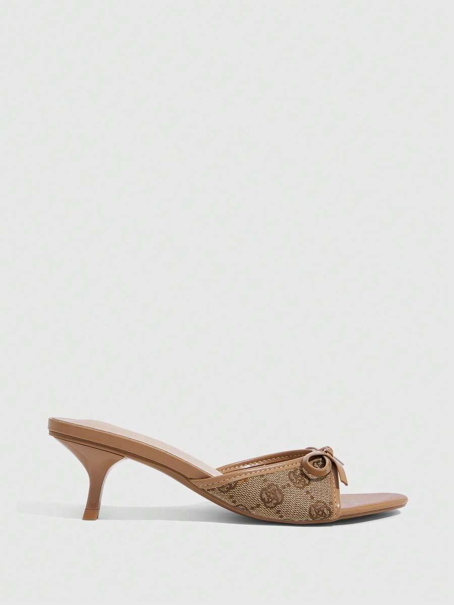 Burgundy high heel sandals for women featuring an open toe, decorative bow, 5.5cm kitten heel, and slingback strap.