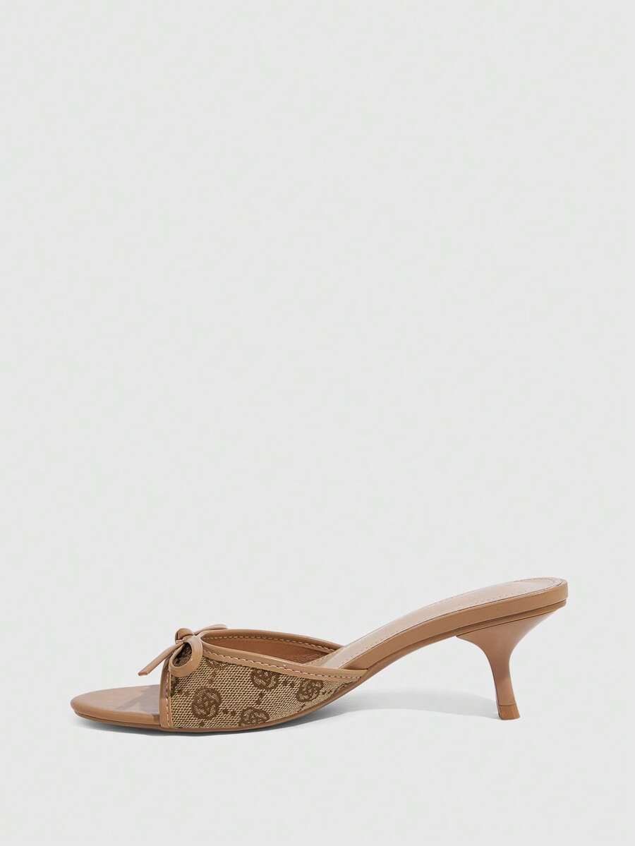 Burgundy high heel sandals for women featuring an open toe, decorative bow, 5.5cm kitten heel, and slingback strap.