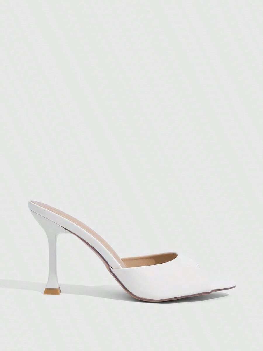Women's sleek high heel slingback sandals with PU leather finish and stylish pyramid heel.