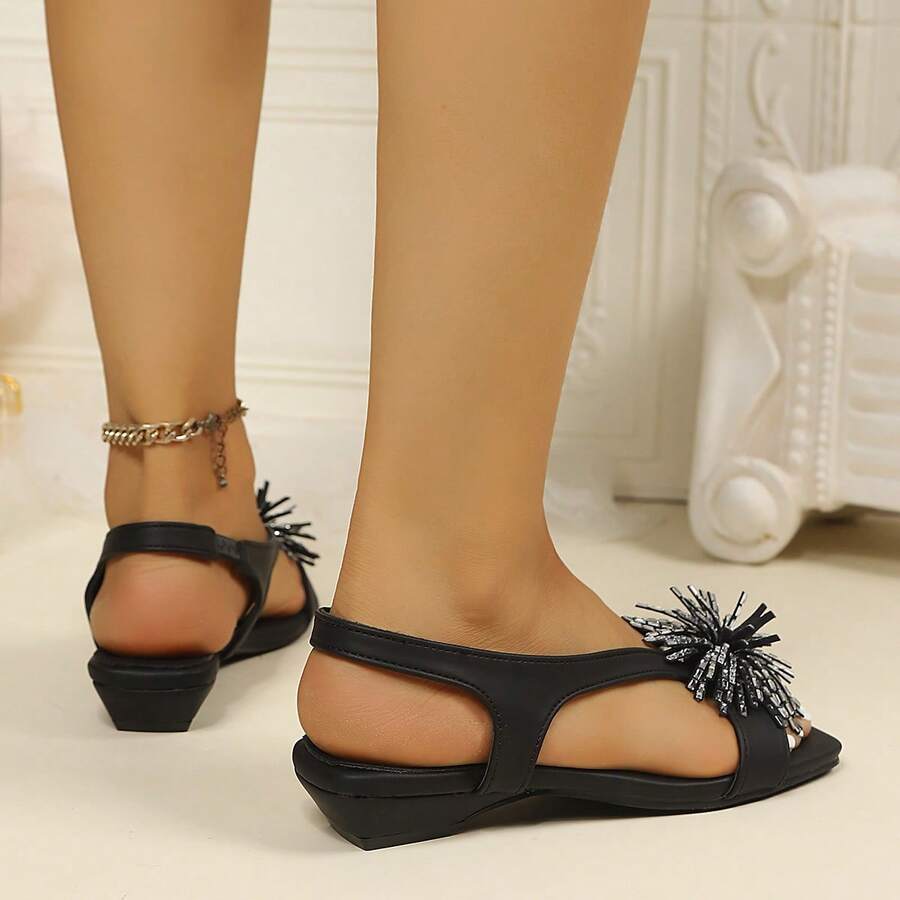 Women's square toe kitten heel thong sandals featuring a sleek toe-post strap and low heel design