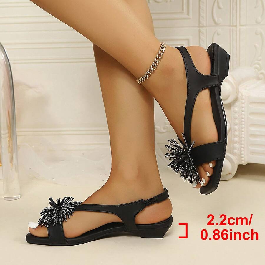 Women's square toe kitten heel thong sandals featuring a sleek toe-post strap and low heel design