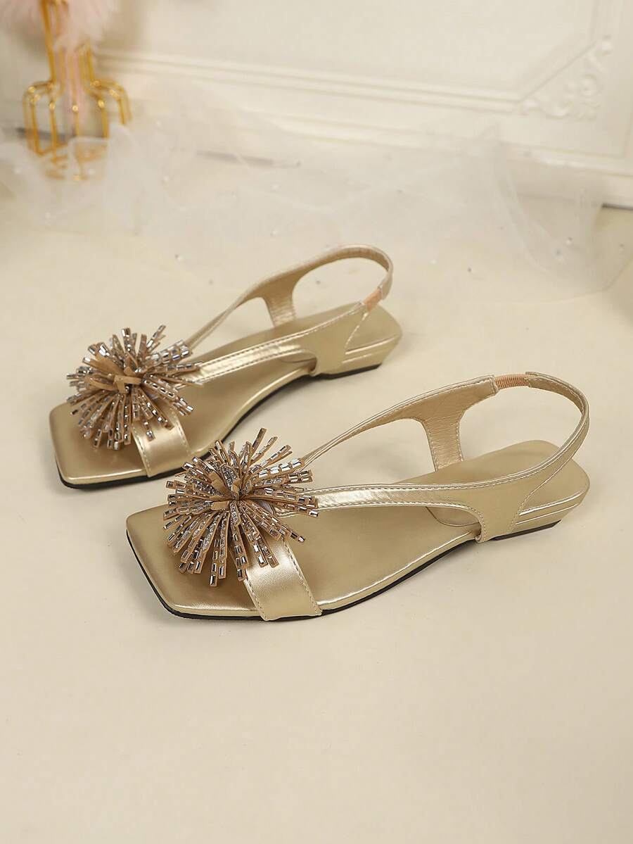 Women's square toe kitten heel thong sandals featuring a sleek toe-post strap and low heel design
