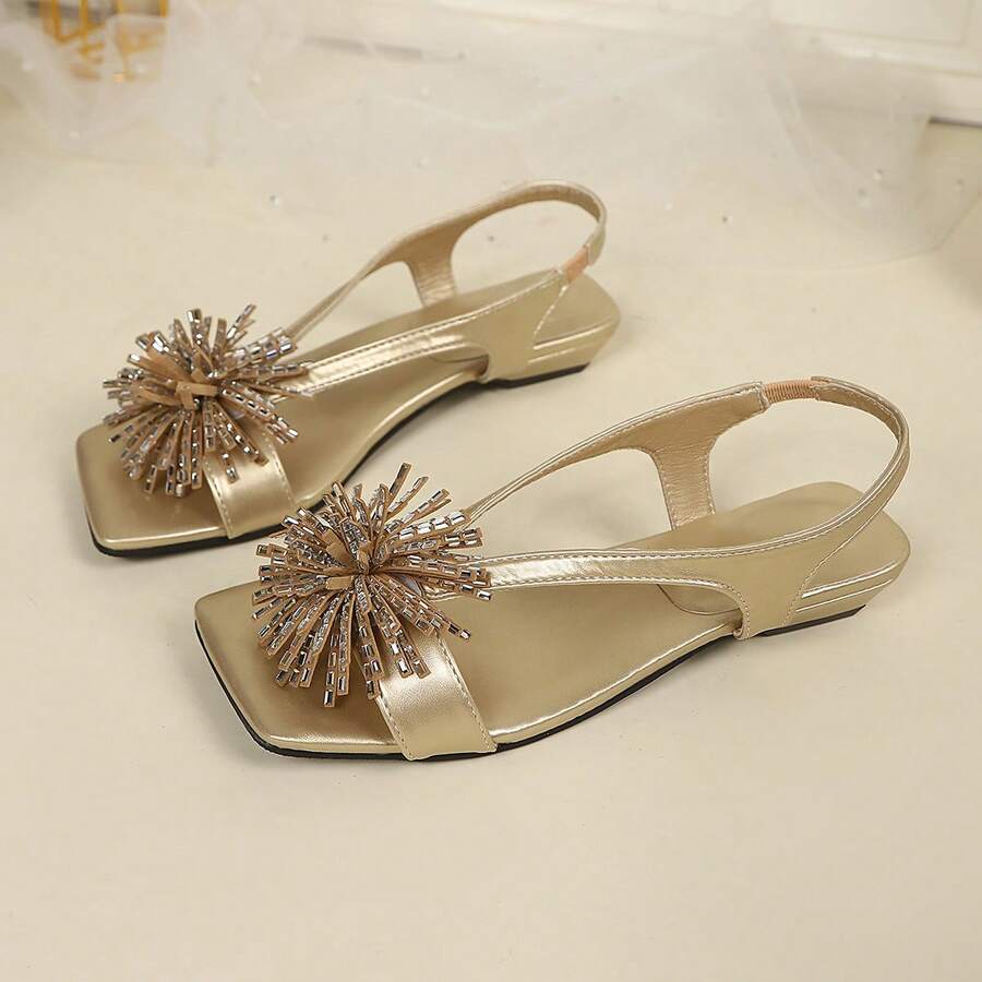 Women's square toe kitten heel thong sandals featuring a sleek toe-post strap and low heel design